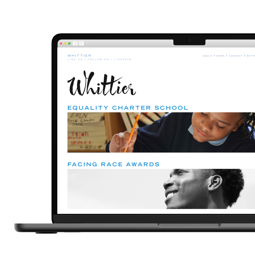 A laptop mockup displaying the homepage for Whittier Advertising.